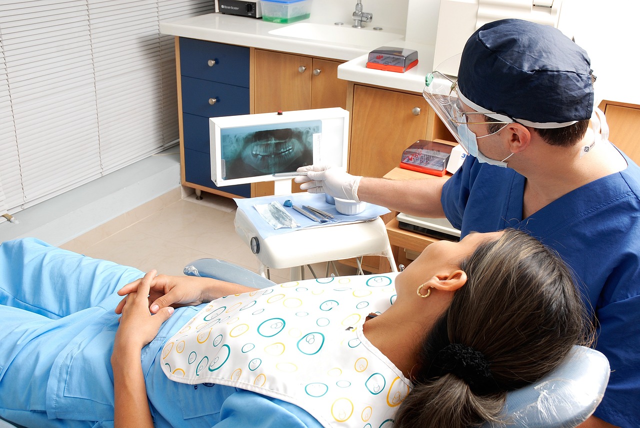 Wide hero photo: the office, or Dr. Burney with a patient